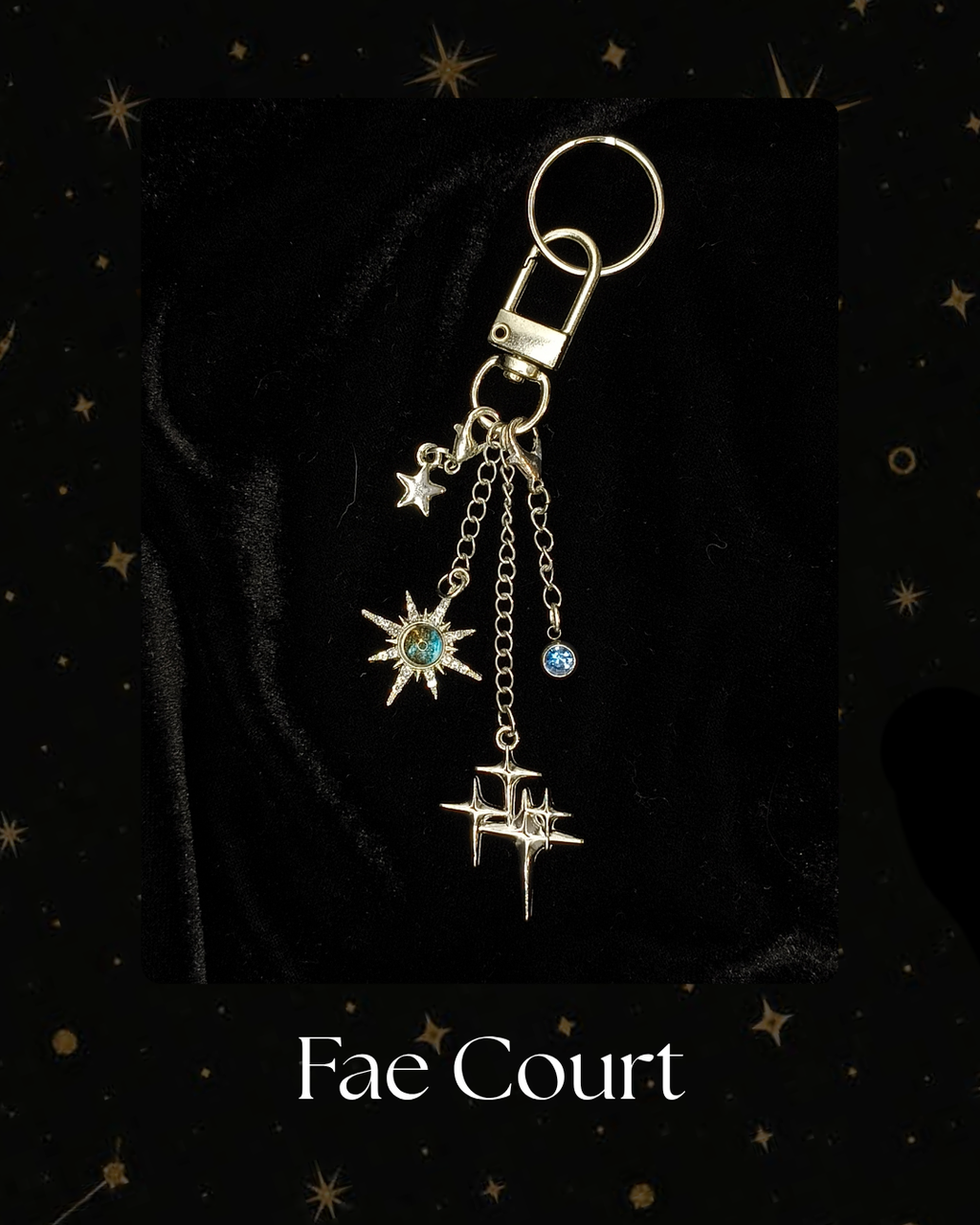 Charmlet for Kindle, e-reader, A silver-toned keychain with multiple celestial charms, including stars and a crescent moon, for Kindle, Kobo, Kindle Accessory, One More Chapter