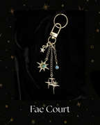 Charmlet for Kindle, e-reader, A silver-toned keychain with multiple celestial charms, including stars and a crescent moon, for Kindle, Kobo, Kindle Accessory, One More Chapter