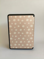One More Chapter Premium Kindle Case in Petals & Prologues – single closed folio back view, blush pink with scattered white floral print