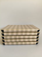 One More Chapter Premium Kindle Case in Booked for Brunch – four cases stacked flat, side-on view, sage and cream gingham
