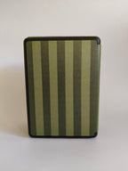 One More Chapter Premium Kindle Case in Midnight Library – single closed folio back view, olive and dark green vertical stripe