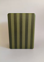 One More Chapter Premium Kindle Case in Midnight Library – single closed folio front view, olive and dark green vertical stripe