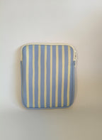 One More Chapter E-reader Sleeve in Rainy Sunday – single padded sleeve front view showing the back, periwinkle blue and cream vertical stripe with white zip